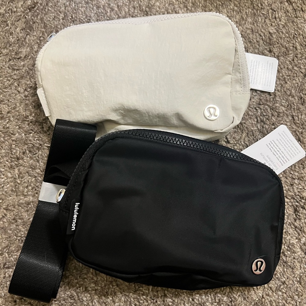 Lululemon everywhere belt bags in Opal white and black